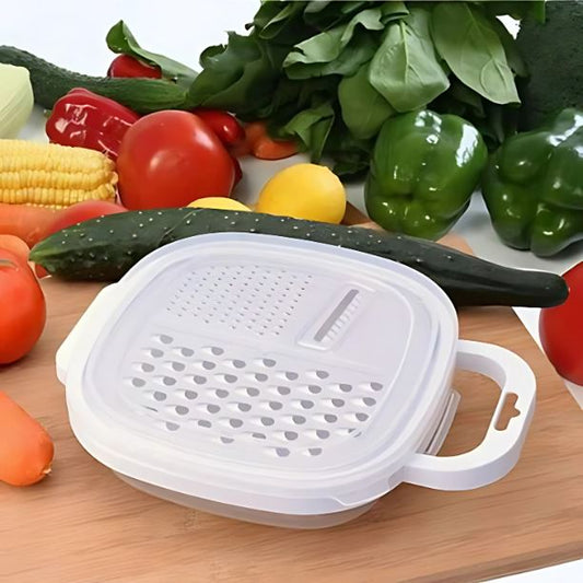 Rape a legumes manuelle blanche avec bol